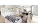 Comfortable living room with modern decor, ceiling fan, and neutral paint at 13903 Sage Thrasher Ln, Riverview, FL 33579
