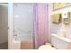 Clean bathroom featuring a shower/tub, a toilet, and towel rack at 14840 Shipwatch Trce # 1924, Largo, FL 33774