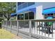 Spacious deck featuring sliding glass doors and comfortable lounge chairs at 14840 Shipwatch Trce # 1924, Largo, FL 33774