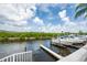Private boat dock with boat lift and peaceful water views at 14840 Shipwatch Trce # 1924, Largo, FL 33774