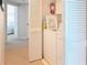 Practical laundry area with washer, dryer, and storage, conveniently located inside the house at 14840 Shipwatch Trce # 1924, Largo, FL 33774