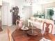 Open-concept living and dining room with elegant furnishings and ample natural light at 14840 Shipwatch Trce # 1924, Largo, FL 33774