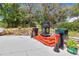 Picturesque backyard features a fire pit area, perfect for outdoor relaxation and entertaining at 15625 Olney Ln, Spring Hill, FL 34610