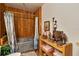 Unique bathroom showcasing a rustic galvanized steel tub, wood paneling, and vintage western decor at 15625 Olney Ln, Spring Hill, FL 34610