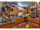 Cozy kitchen with wood cabinets, stainless steel appliances, and ample counter space at 15625 Olney Ln, Spring Hill, FL 34610