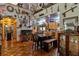 View of the kitchen and dining area with custom cabinetry and decor at 15625 Olney Ln, Spring Hill, FL 34610