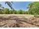Large flat lot with trees at 15625 Olney Ln, Spring Hill, FL 34610