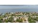 Wonderful aerial view of a scenic coastal neighborhood with charming homes near the water at 1579 Bayshore Blvd, Dunedin, FL 34698