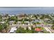 Aerial view of neighborhood homes near the water and the coast at 1579 Bayshore Blvd, Dunedin, FL 34698