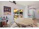 Bright dining space with backyard access, round table, seating for four, and unique chandelier at 1579 Bayshore Blvd, Dunedin, FL 34698