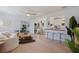 Open-concept living room with a seamless flow to the dining area and kitchen, perfect for entertaining at 1579 Bayshore Blvd, Dunedin, FL 34698
