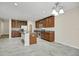 Modern kitchen with stainless steel appliances, granite countertops, ample cabinet space, and a functional center island at 16016 Persimmon Grove Dr, Lithia, FL 33547