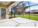 Screened patio with nice views of the well-kept backyard at 16016 Persimmon Grove Dr, Lithia, FL 33547