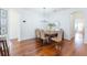 Cozy dining room with chandelier lighting and open access to other living spaces at 20403 Sultana Ct, Tampa, FL 33647