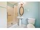 Bathroom with accessible features including walk in shower at 2205 Henley Rd, Lutz, FL 33558