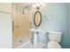 Bathroom with accessible features including walk in shower at 2205 Henley Rd, Lutz, FL 33558