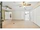 Bonus room with neutral carpet and multiple access doors at 2205 Henley Rd, Lutz, FL 33558
