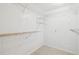Walk-in closet with adjustable wire shelving at 2205 Henley Rd, Lutz, FL 33558