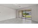 Spacious living area with sliding glass doors to the outside at 2280 Long Spur, Odessa, FL 33556
