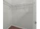 A walk-in closet with white wire shelving provides ample storage space at 2280 Long Spur, Odessa, FL 33556