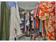 Walk-in closet featuring rods and shelves that provide ample storage space at 230 Medallion Blvd # F, Madeira Beach, FL 33708