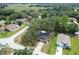 Birds-eye view of the property, showcasing its layout, landscaping, and neighborhood at 2410 Covington Ave, Spring Hill, FL 34608