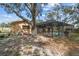Backyard showing a screened-in pool, enhancing outdoor living and entertainment at 2410 Covington Ave, Spring Hill, FL 34608