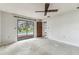 Bedroom with sliding glass doors providing a view of the pool at 2410 Covington Ave, Spring Hill, FL 34608