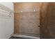 Spacious walk-in closet with shelving provides ample storage at 2410 Covington Ave, Spring Hill, FL 34608