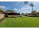 Well-maintained home featuring lush green lawns and vibrant landscaping at 2444 Laurelwood Dr # A, Clearwater, FL 33763