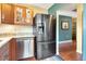 Kitchen with granite countertop and stainless steel appliances at 2444 Laurelwood Dr # A, Clearwater, FL 33763