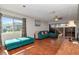 Bright living room with a comfortable sectional sofa, natural light, and stylish furnishings at 2444 Laurelwood Dr # A, Clearwater, FL 33763