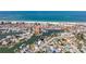 Gorgeous aerial view features the property near the beach and offers easy access to waterfront activities at 253 Boca Ciega Dr, Madeira Beach, FL 33708
