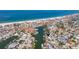 Stunning aerial view of a waterfront property that offers convenient access to the beach and waterfront activities at 253 Boca Ciega Dr, Madeira Beach, FL 33708