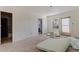Bedroom with an attached bathroom featuring a doorway leading to an adjacent room at 253 Boca Ciega Dr, Madeira Beach, FL 33708