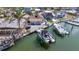Waterfront home featuring a spacious deck, boat dock, and proximity to the water at 253 Boca Ciega Dr, Madeira Beach, FL 33708