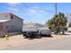 Charming home exterior with RV parking and palm trees at 253 Boca Ciega Dr, Madeira Beach, FL 33708
