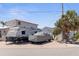 Front exterior of property with vehicle and RV parking at 253 Boca Ciega Dr, Madeira Beach, FL 33708
