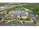 Stunning community clubhouse with a pool, tennis courts, and a playground for endless recreation and relaxation at 30764 Lindentree Dr, Wesley Chapel, FL 33543