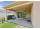 Inviting covered patio featuring ample space for outdoor entertaining and relaxation at 30764 Lindentree Dr, Wesley Chapel, FL 33543