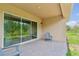Enjoy outdoor living on this spacious patio with views of the private backyard at 30764 Lindentree Dr, Wesley Chapel, FL 33543