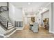 Dining room with staircase, wood floors, and chandelier lighting at 3209 W Morrison Ave, Tampa, FL 33629