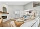 Open concept living room flowing to a well-appointed kitchen with stainless steel appliances at 3209 W Morrison Ave, Tampa, FL 33629