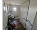 Bathroom view showing the toilet, sink, shower, and storage closet at 32348 Marchmont Cir, Dade City, FL 33523