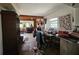 Open dining room, in need of repairs at 32348 Marchmont Cir, Dade City, FL 33523