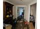 Hallway with tile flooring and decorative built-in shelving, showcasing the home's character at 32348 Marchmont Cir, Dade City, FL 33523