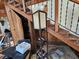 View of a carpeted staircase and decorative elements including a lamp and assorted items at 32348 Marchmont Cir, Dade City, FL 33523