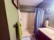 Bathroom featuring single shower, vanity and vintage accents at 3338 Fernleaf Dr, Hernando Beach, FL 34607