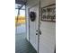 Front door with a decorative wreath and a view of the lake at 3338 Fernleaf Dr, Hernando Beach, FL 34607