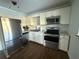Bright kitchen boasts stainless steel appliances, ample cabinet space, and granite countertops at 3338 Fernleaf Dr, Hernando Beach, FL 34607
